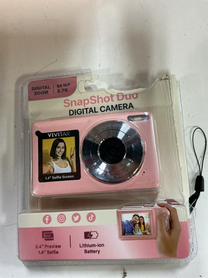 Condition photo showing As Is for vivitar snapshot duo digital camera - petal pink