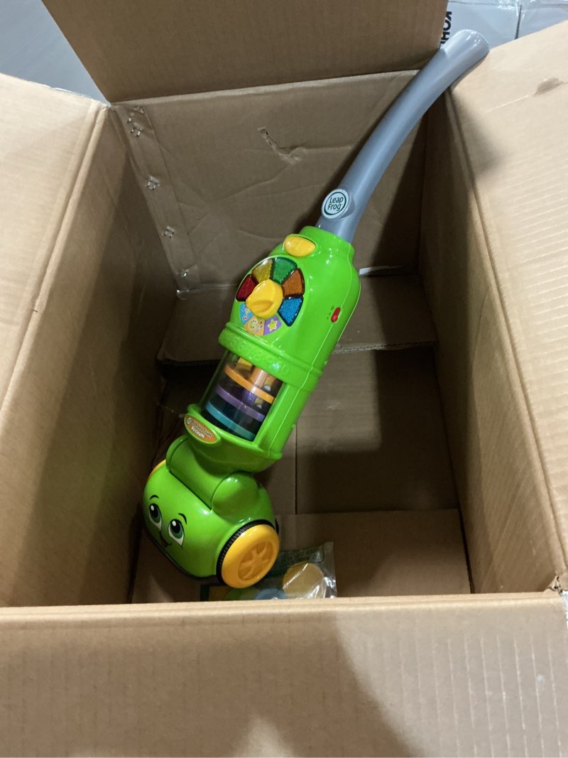 Condition photo showing As Is for LeapFrog Pick Up and Count Vacuum, Green