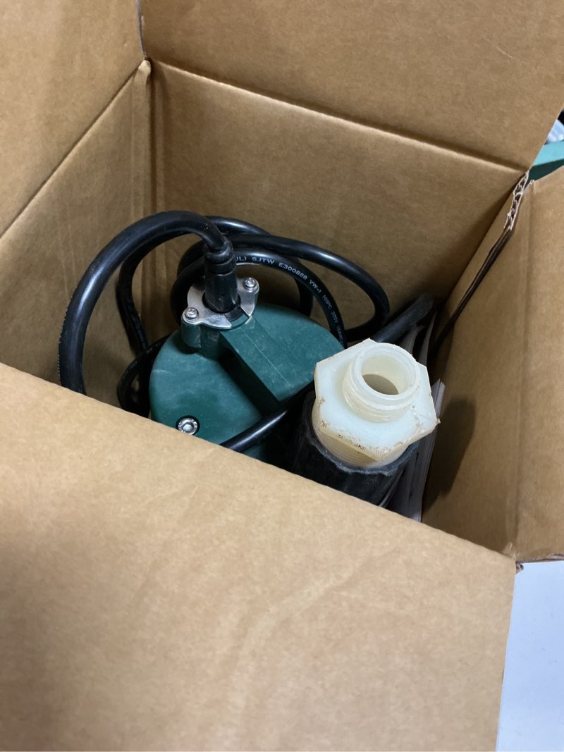 Condition photo showing As Is for zoeller 1/3 hp 2100 gph thermoplastic electronic switch bottom ac submersible utility pump