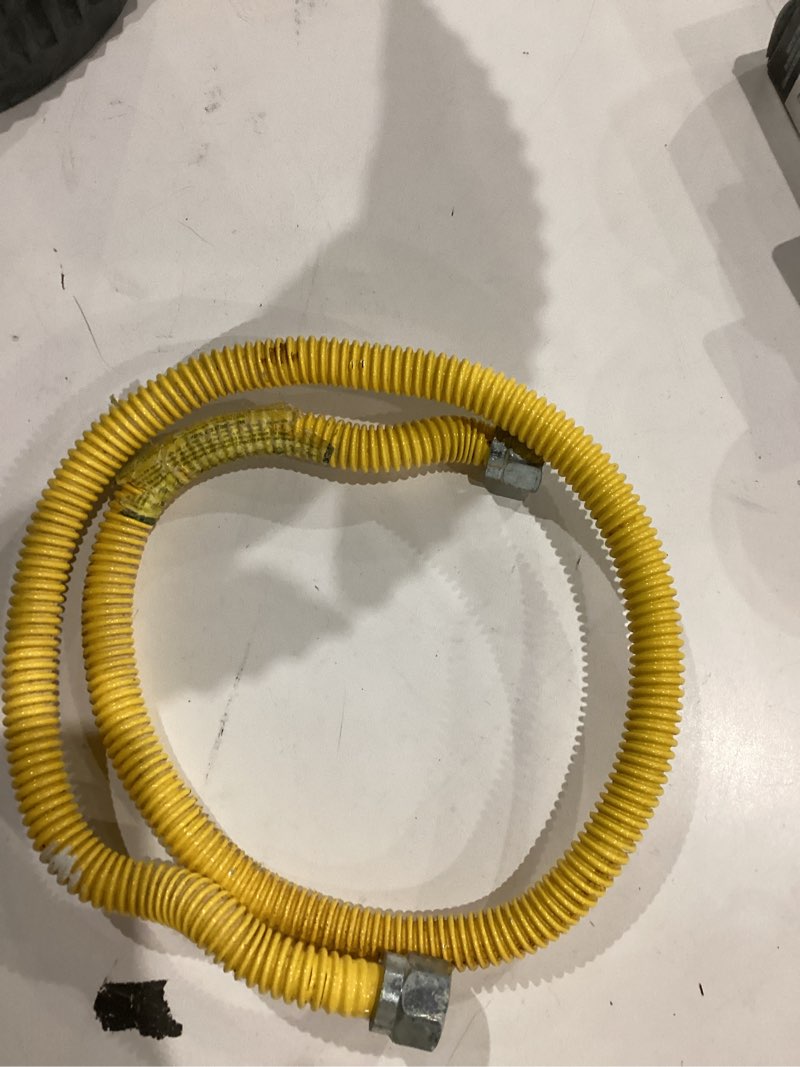 Condition photo showing As Is for mcampas flexible gas connector kit od yellow coated stainless steel,id gas hose for dryer, stove,