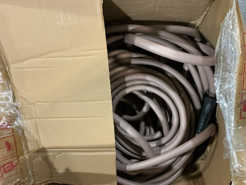 Condition photo showing As Is for flexzilla colors swivelgrip garden hose 5/8 in. x 100 ft., lightweight all-weather water hose, durable and flexible, leak-free connections, brown mulch swivelgrip 100ft brown mulch