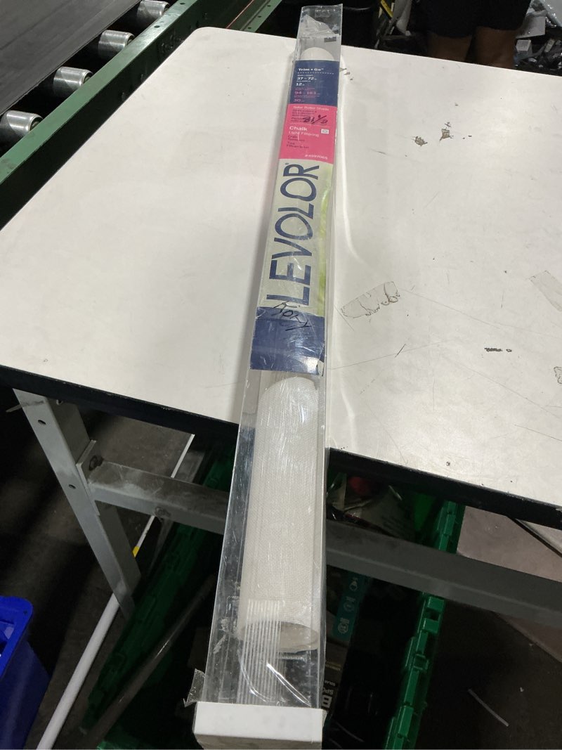 Condition photo showing As Is for levolor 37-in x 72-in chalk light filtering cordless solar roller shade