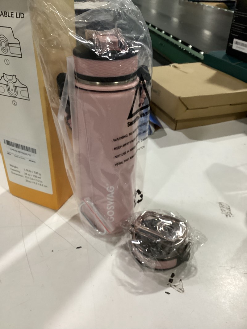 Condition photo showing As Is for GOSWAG Insulated Sports Water Bottle, 24oz 2 Lids(with Straw/No Straw), Stainless Steel Water Bottles with Paracord Handle, Insulated Bottle with Double-Wall Vacuum Insulation Matte Pink