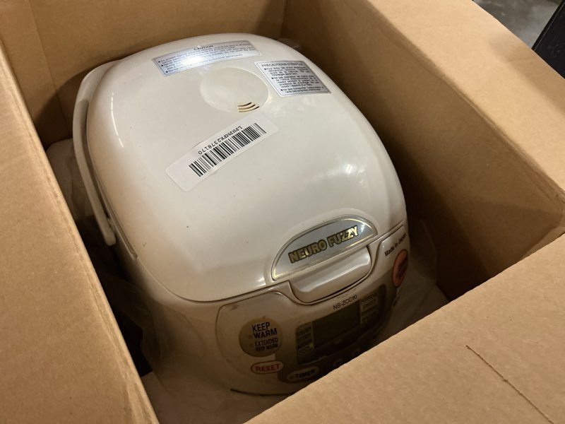 Condition photo showing As Is for Zojirushi NS-ZCC10 5-1/2-Cup Neuro Fuzzy Rice Cooker and Warmer, Premium White 5.5-Cup uncooked rice