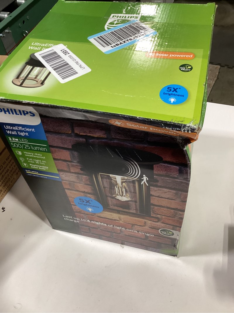 Condition photo showing Good Condition for philips solar led 1-pack geri ultraefficient outdoor wall light, motion sensor, 2700k, round, black, 500 lumen, high brightness, glass, metal