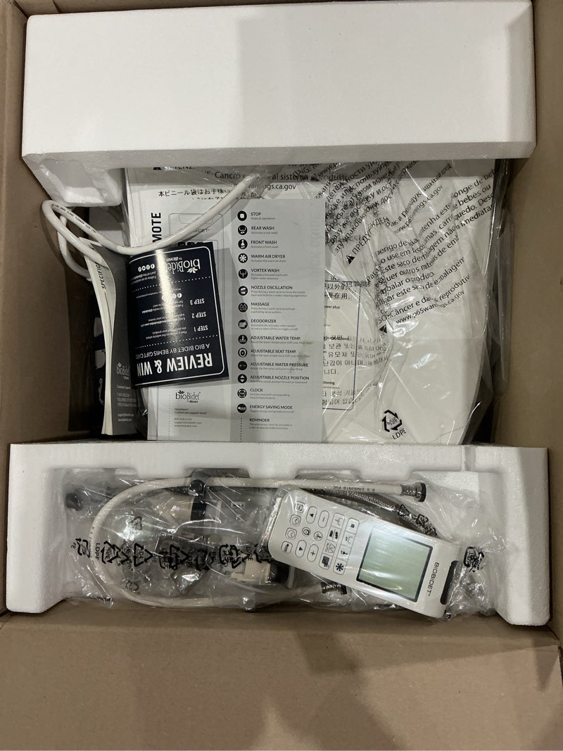 Condition photo showing Good Condition for bliss bb-2000 electric bidet seat for elongated toilets in white with drylette towels