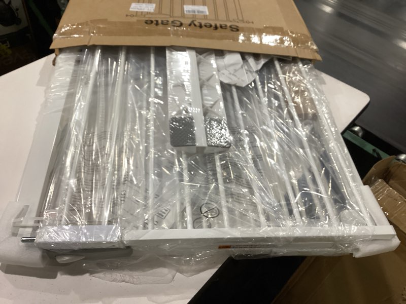 Condition photo showing New/Like New for dearbb triple lock baby gate for stairs doorways and house 31" to 86" extra wide pressure mounted easy walk through auto close safety pet gate white 67.32-76.77"