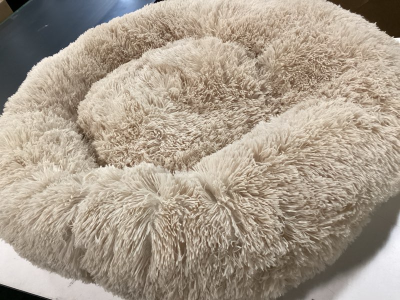 Condition photo showing As Is for Donut Dog Bed - Premium Comfort for Anxiety Relief - Fluffy & Calming Design with Ultra-Plush Support | Cozy Round Dog Bed with Super Soft Circle Style (Beige, Large) Large Beige