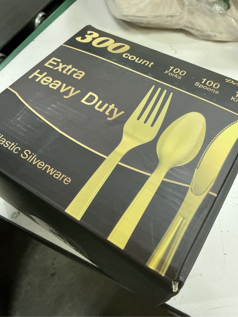 Condition photo showing New/Like New for 300 count extra heavy duty gold plastic silverware, 100 forks, 100 spoons, 100 knives, bpa-free, heat resistant, disposable plastic utensils set, plastic cutlery set, plasticware bulk