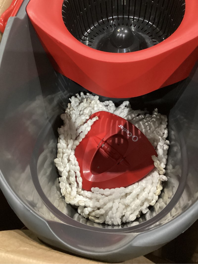 Condition photo showing As Is for o-cedar easywring microfiber spin mop & bucket floor cleaning system + 2 extra refills, red/gray spin mop & bucket with 2 extra refills
