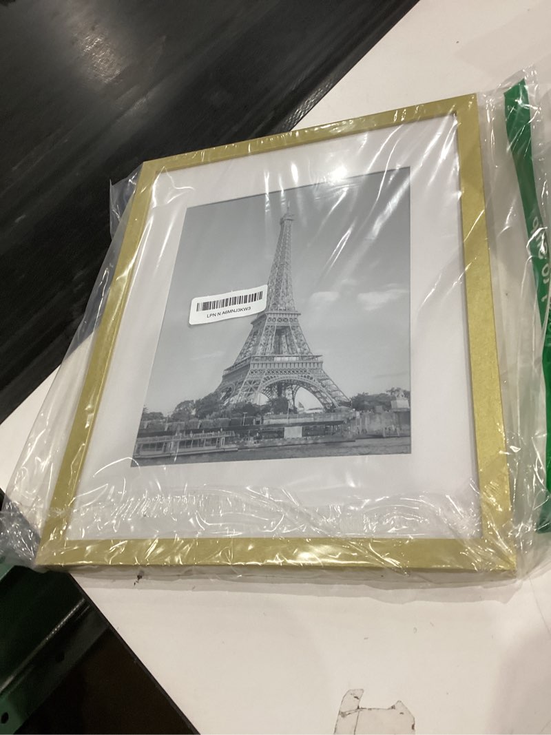 Condition photo showing Good Condition for upsimples 11x14 Picture Frame, Display Pictures 8x10 with Mat or 11x14 Without Mat, Wall Hanging Photo Frame, Gold, 1 Pack Gold 11x14