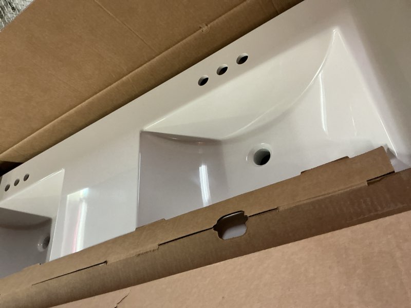 Condition photo showing As Is for project source 60-in vanity with cultured marble top