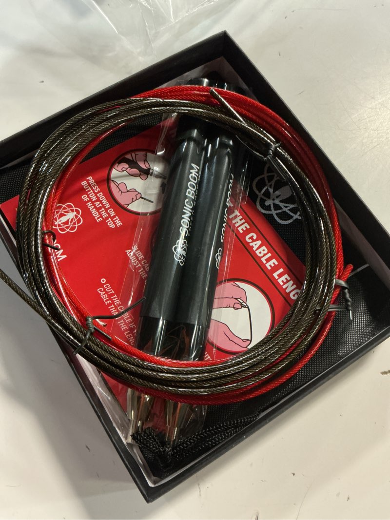 Condition photo showing Good Condition for epitomie fitness sonic boom m2 high speed jump rope - patent pending self-locking, screw-free design – weighted, 360 degree spin, silicone grip with 2 speed rope cables for home workout, & more carbon black