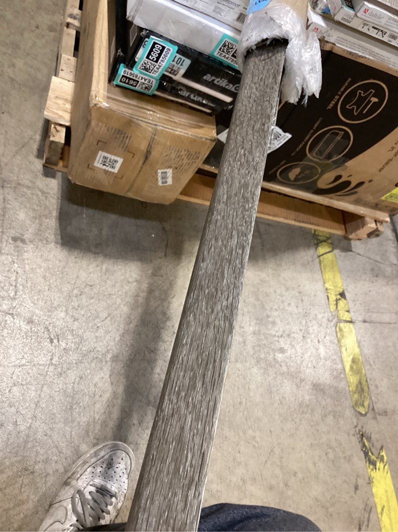 Condition photo showing As Is for gray oak  vinyl backsplash accessory