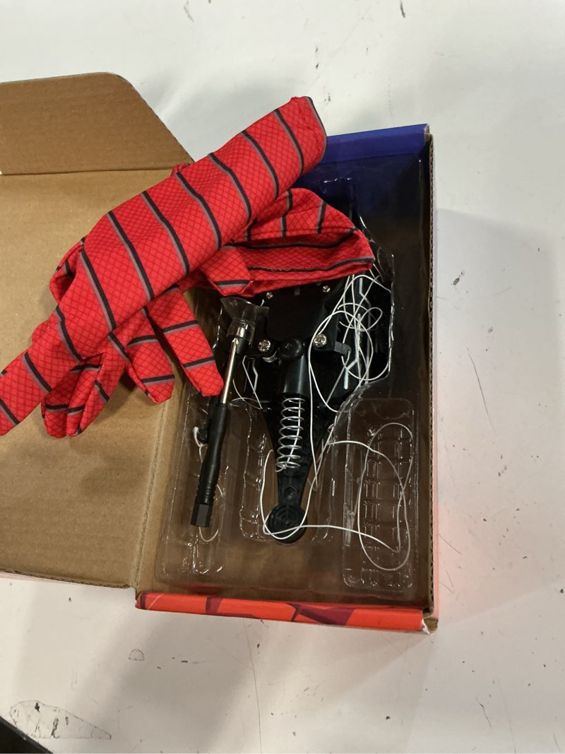 Condition photo showing Good Condition for spider web shooter, real web slinger that actually shoots for kids, cool toy things for superhero fans black