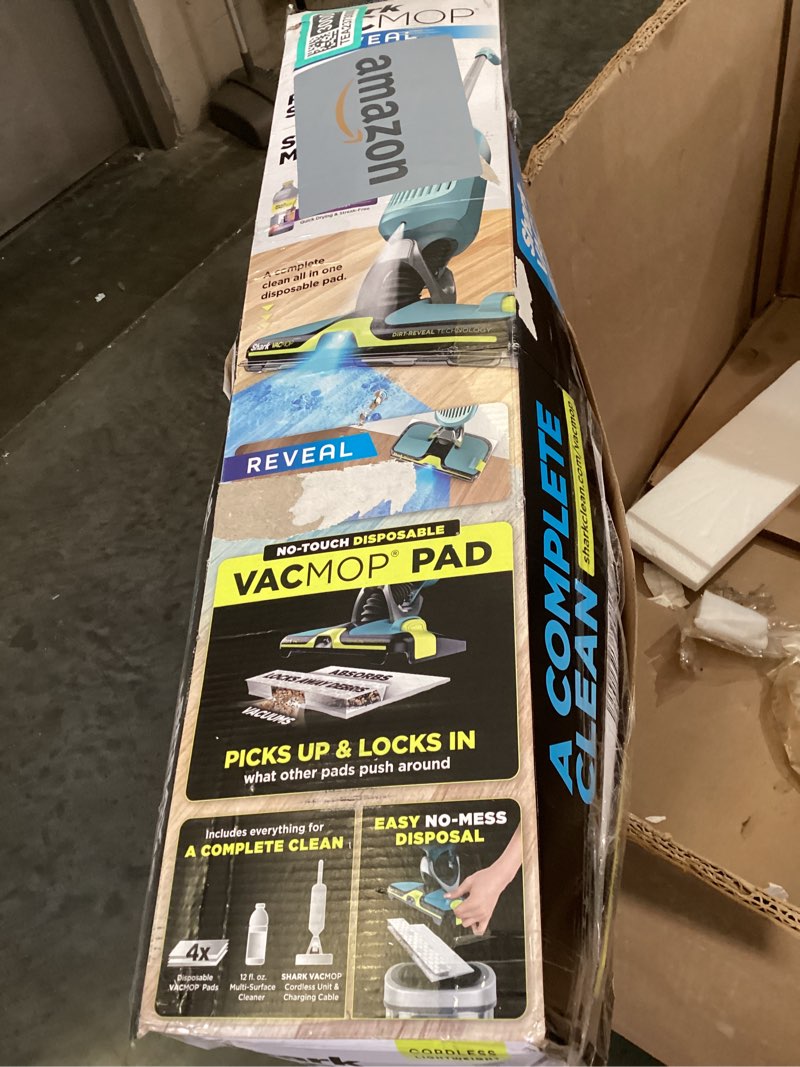 Condition photo showing As Is for shark vacmop reveal new cordless hard floor cleaner, vacuum & spray mop, powerful suction, lightweight, illumination light, includes 4 disposable pads, 12oz pet multi-surface cleaning solution, vm401