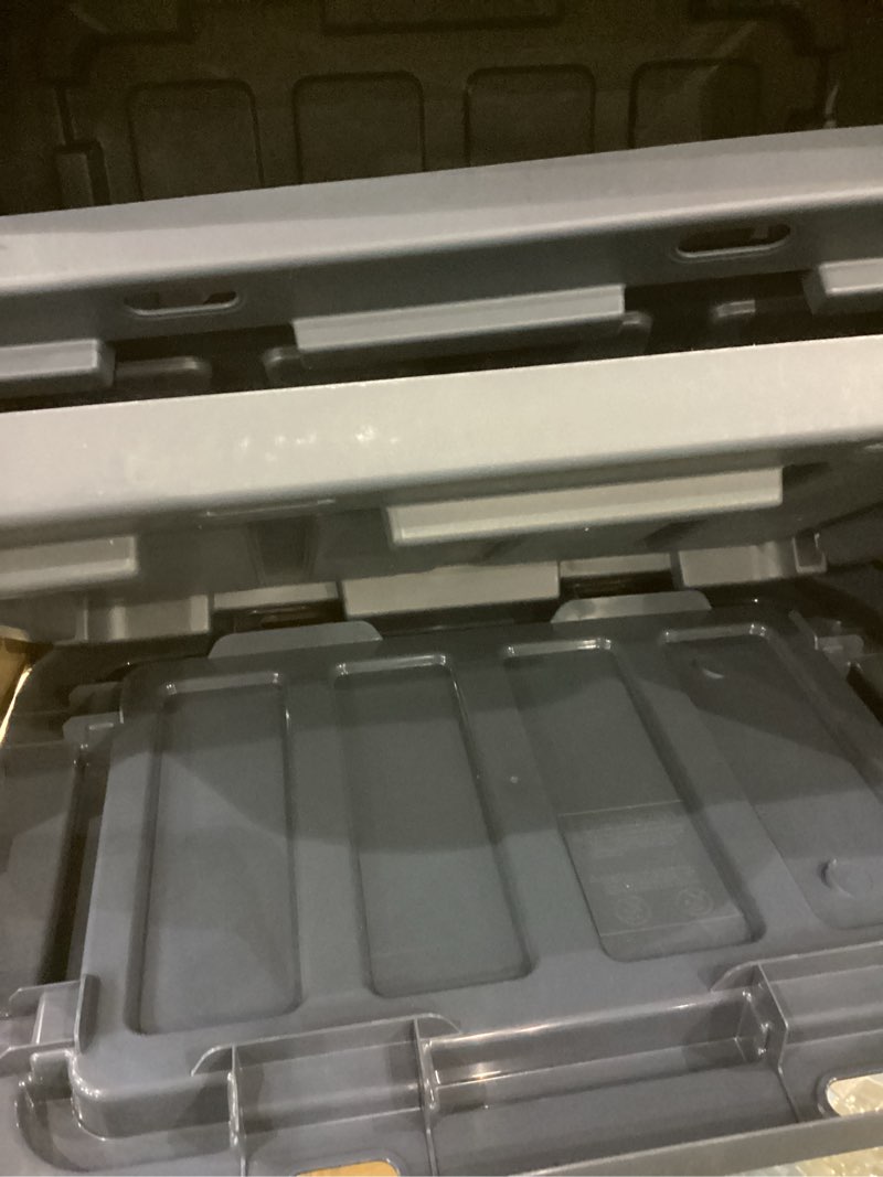 Condition photo showing As Is for IRIS USA 12 Gallon Eco-Friendly Heavy Duty Truck Bed Toolbox Storage Tote Bins with Lids, 4 Pack - Made in USA, Tough Snap On Lockable Lid Stackable Industrial Rugged Tubs, Garage Organization - Navy Navy 12 Gal - 4 Pack