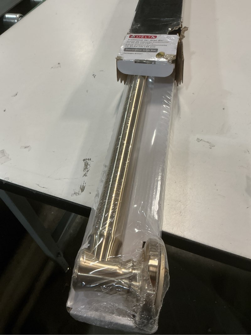 Condition photo showing New/Like New for Delta Traditional (1-Pack) 36' Shower Grab Bar ADA Compliant Champagne Bronze 450 lb Capacity Bathroom Safety Handle for Shower, Bathtub | Wall Mounted Balance Assist, Handicap Grip 41636-CZ 36 Inch Champagne Bronze