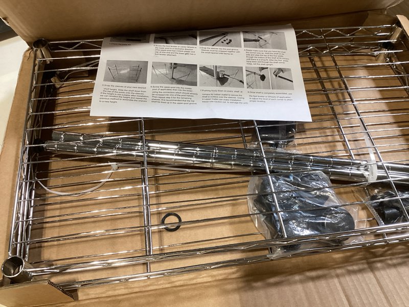 Condition photo showing Good Condition for 2-tier wire shelving with wheels,storage shelves with gaskets,adjustable metal shelving unit shelf organizer for kitchen living room,garage,office,laundry,pantry,18"d x 36"w x 26"h,chrome chrome 18"d x 36"w x 25"h