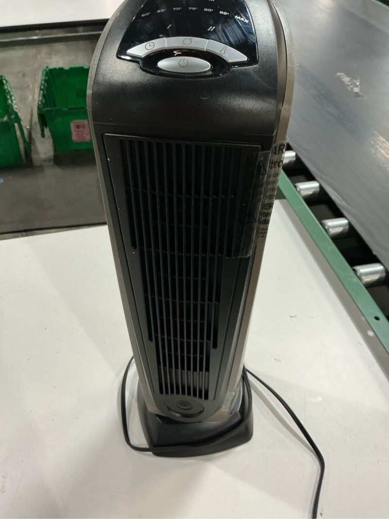 Condition photo showing As Is for Lasko 1500W Ceramic Tower Space Heater with Remote, Thermostat, Timer & Widespread Oscillation, Portable Electric Heater for Indoor Use, Bedroom & Living Room, 751320