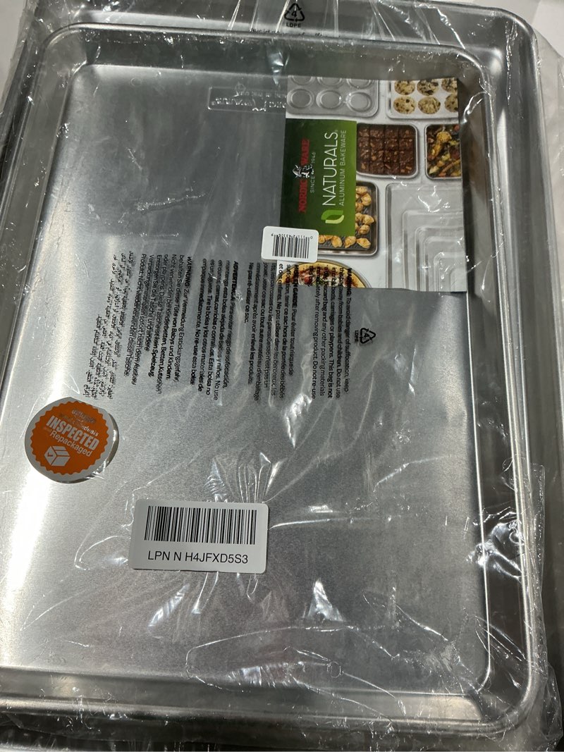 Condition photo showing Good Condition for nordic ware naturals half sheet - usa made aluminum commercial quality sheet pan for baking or roasting, encapsulated galvanized steel rim prevents warping, 2-pack 2pk half sheet