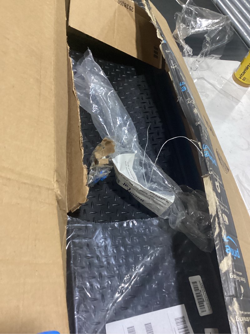 Condition photo showing Good Condition for Rubber-Cal "Diamond-Plate Non-Slip Rubber Tread Stair Mats (6 Pack), Black, 9.75" X 29.75" Industrial