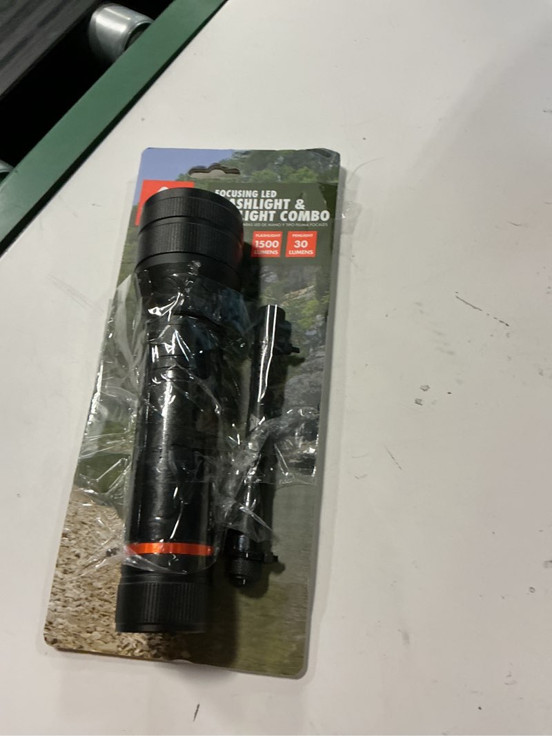 Condition photo showing Good Condition for ozark trail 1500 lumen focusing flashlight with bonus penlight, waterproof, black
