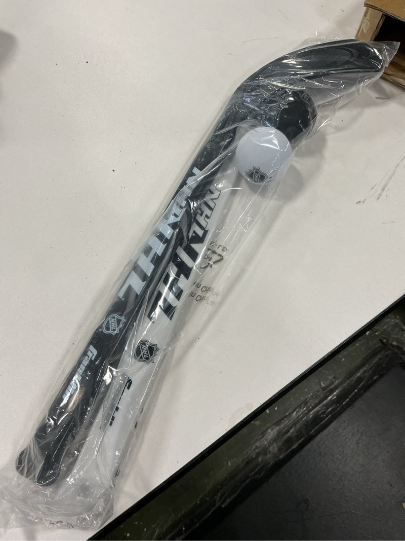 Condition photo showing New/Like New for Franklin Sports NHL Mini Hockey Stick and Ball Set - Kids Indoor Knee Hockey Game Set - Includes 2 Mini Sticks and 2 Foam Balls
