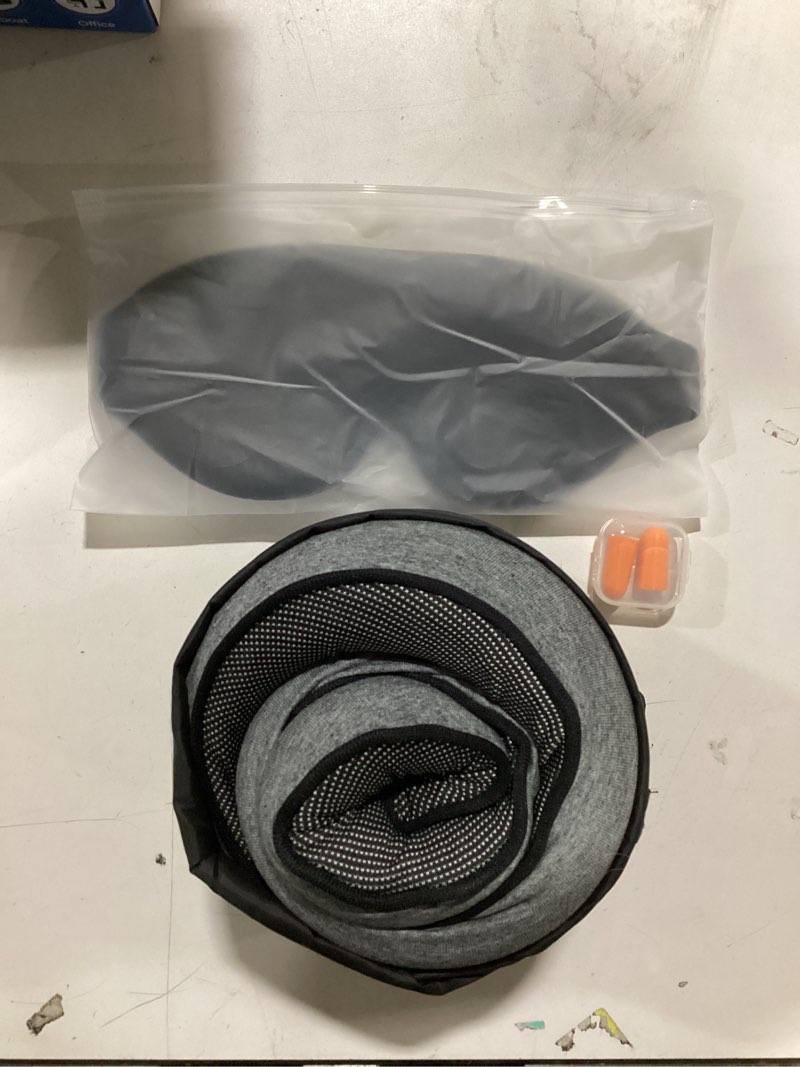 Condition photo showing New/Like New for Travel Neck Pillow with 100% Pure Memory Foam, G-Shape, Includes Eye Mask & Ear Plugs, Ergonomic Design for Airplane, Car & Office, etc, Beige Gray