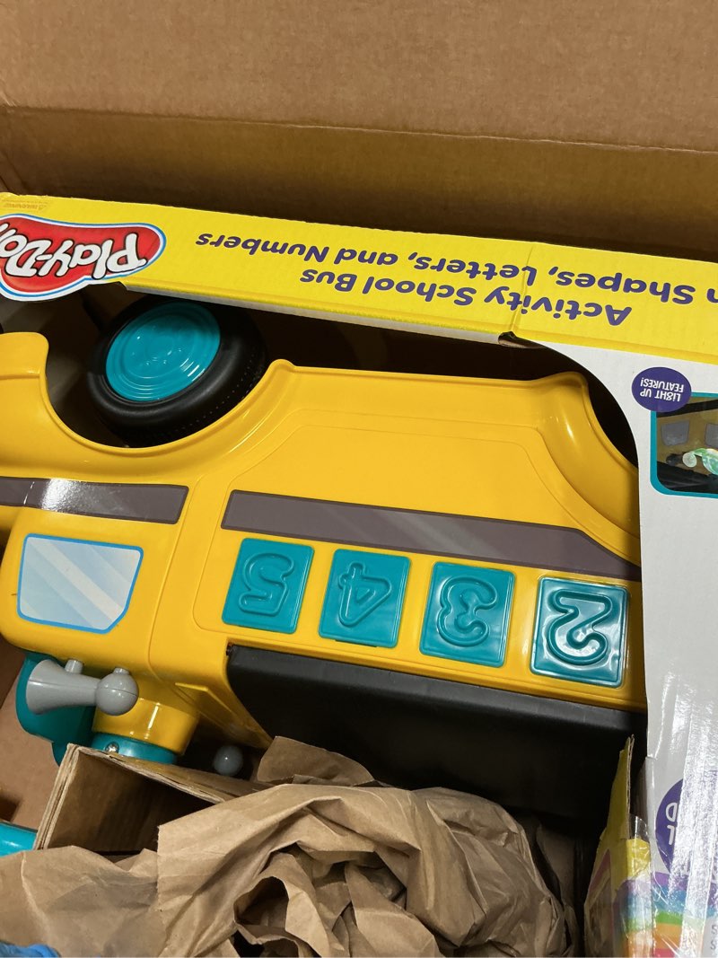 Condition photo showing Good Condition for Play-Doh Activity School Bus - Push and Ride On Toy Car for Kids Up to 44 Lbs, Lights and Sounds. Includes Shape and Number Cutters, Play Doh Set, Kids Ride On Toy, Push Car for Girls and Boys