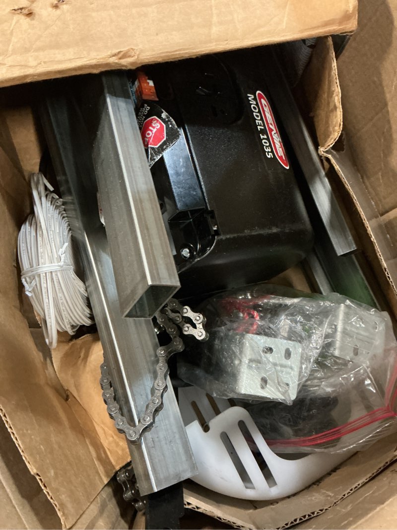 Condition photo showing As Is for genie chain drive 500 garage door opener - model 1035 - reliable chain drive garage opener,black chain 500