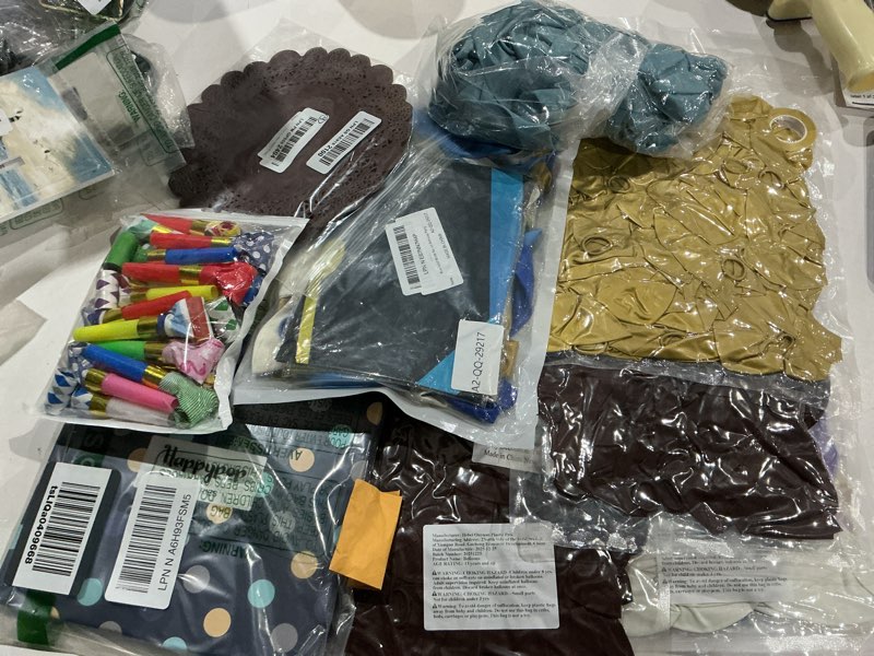 Condition photo showing As Is for assorted celebration/decoration supplies (may include a variety of styles, colors, and theme