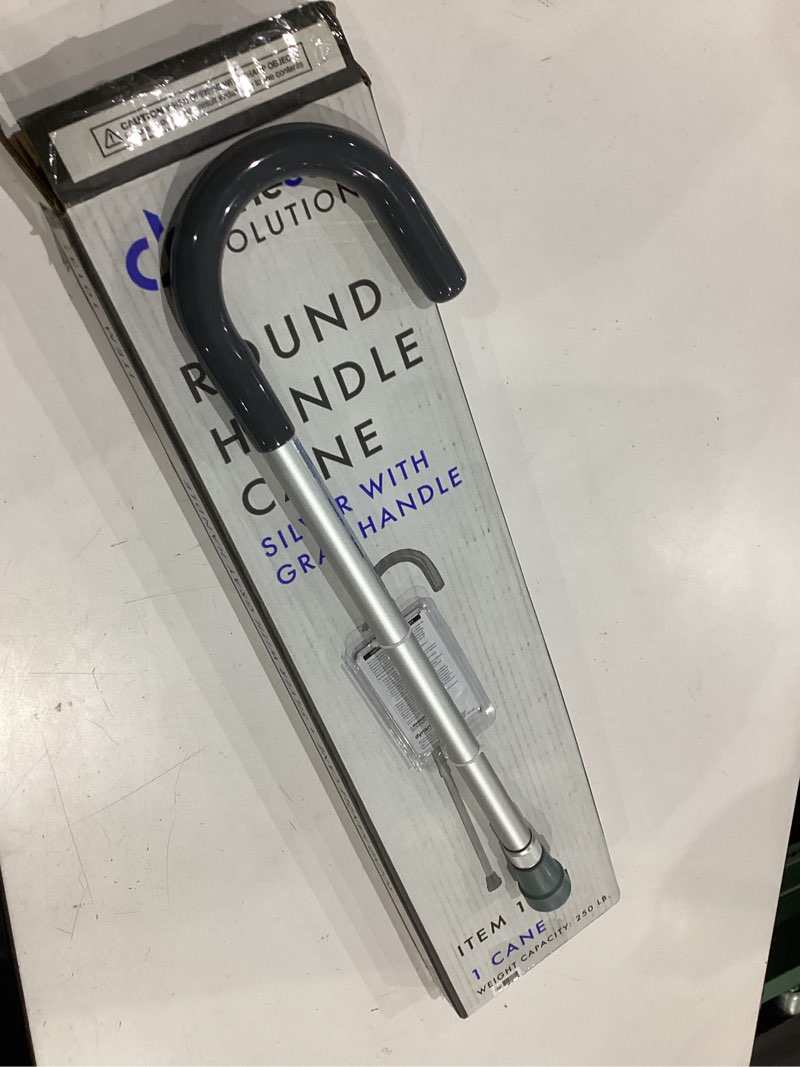 Condition photo showing New/Like New for dynarex lightweight aluminum contoured comfortable round handle cane with vinyl grip, silver