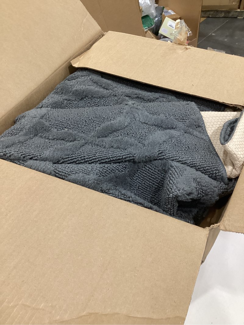 Condition photo showing As Is for Garland Rug Sparta 4 ft. x 6 ft. Area Rug Cinder Gray Cinder Gray 4' x 6' (Rectangular)