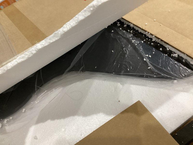 Condition photo showing As Is for Homsion Irregular Wall Mirror, 26"x48" Asymmetrical Mirror with Metal Frame, Modern Wavy Decorative Mirrors for Bathroom, Wall Decor, Entryway, Living Room, Black 26"L x 48"W Art Deco Black