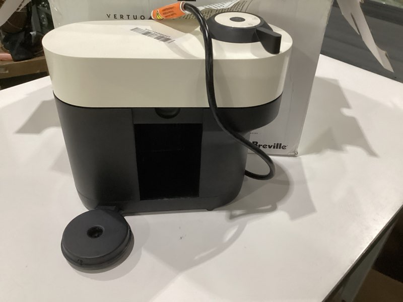 Condition photo showing As Is for nespresso vertuo pop+ coffee and espresso maker by breville with milk frother, coconut white, not tested, missing parts