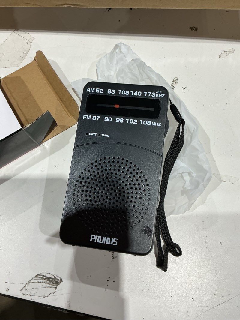 Condition photo showing Good Condition for prunus j-166 portable radio am fm, battery operated radio with tuning light, back clip, excellent reception, am fm radios portable, transistor radios black