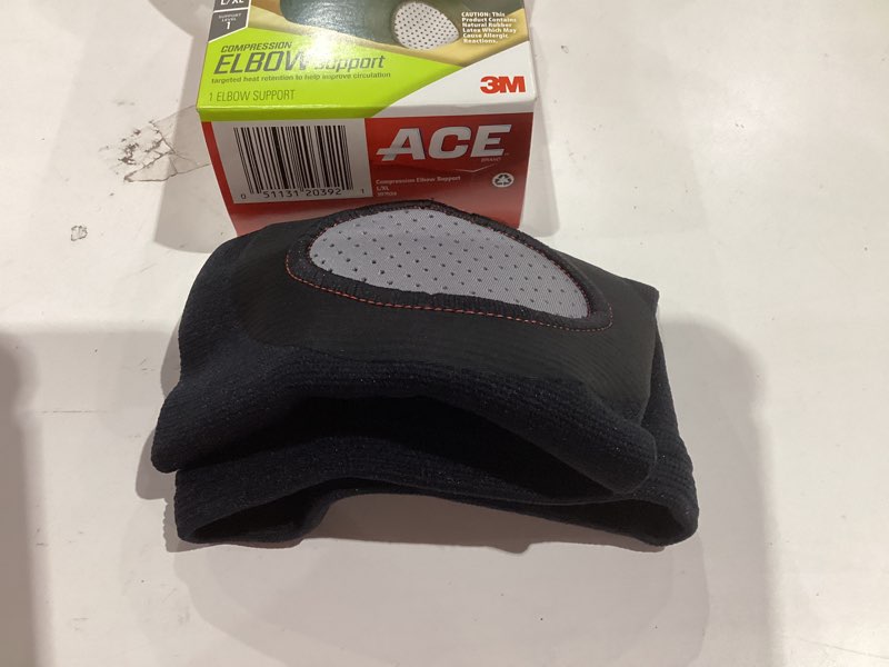 Condition photo showing As Is for ACE Compression Elbow Support, Large/X-Large, Black, 1/Pack Large/X-Large (Pack of 1) Compression Elbow Support