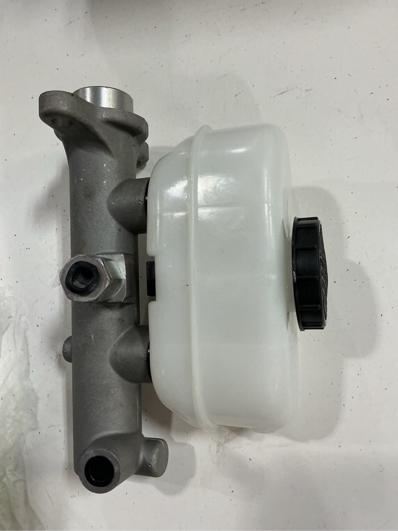 Condition photo showing As Is for a-premium brake master cylinder compatible with ford vehicles - for f-250/f-350 1987-1995, e-250 econoline 1987-1991/1994-1996, e-250 econoline club wagon 1987-1991, e-350 econoline (club wagon)