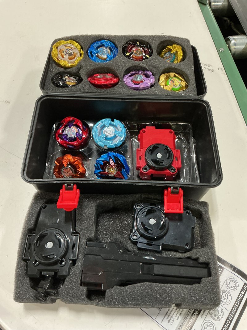 Condition photo showing New/Like New for dezawrty gyro x set, 12 right spinning x blade tops, 2 ripcord launchers, 1 string launcher and 1 grip with storage box, battling game kids toys boys birthday gift ideal for 6+ years old 12pcs