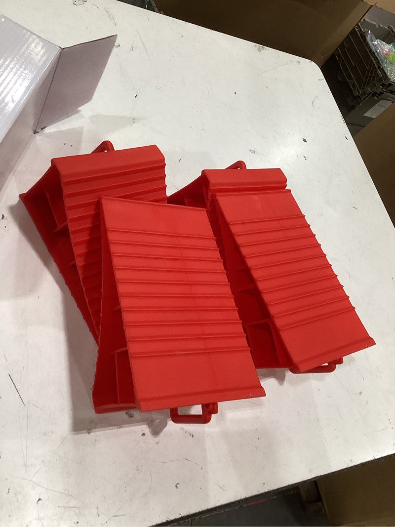 Condition photo showing Good Condition for 4pack wheel chocks for rv trailer non slip heavy duty red camper wheel chocks with handle for easy removal polypropylene wheel stoppers for cars campers trucks rvs 4pc red
