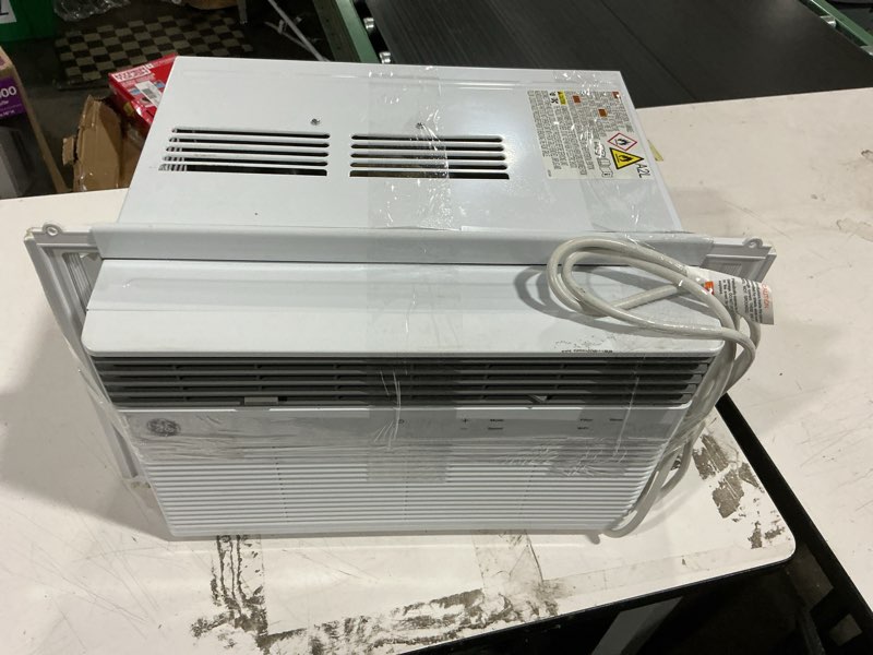 Condition photo showing As Is for 8,000 btu smart window air conditioner for 350 sq. ft. in white