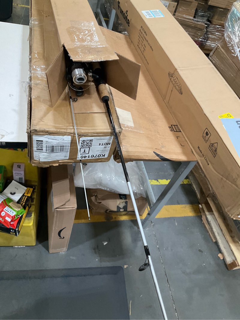 Condition photo showing Good Condition for shakespeare cirrus 6'6" spinning fishing rod and reel combo, 2-piece graphite rod blank, size 30 spinning reel, pre-spooled with monofilament fishing line