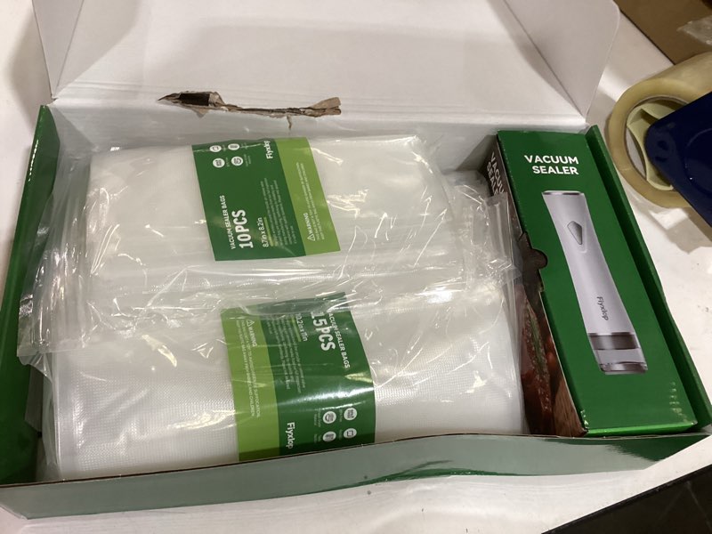 Condition photo showing Good Condition for vacuum sealer for food, premium handheld vacuum sealer + 35 reusable vacuum bags, powerful vacuum food sealer for kitchen, home, bbq, travel, gifts, seal food 6x fresh longer vacuum sealer + 35 bags