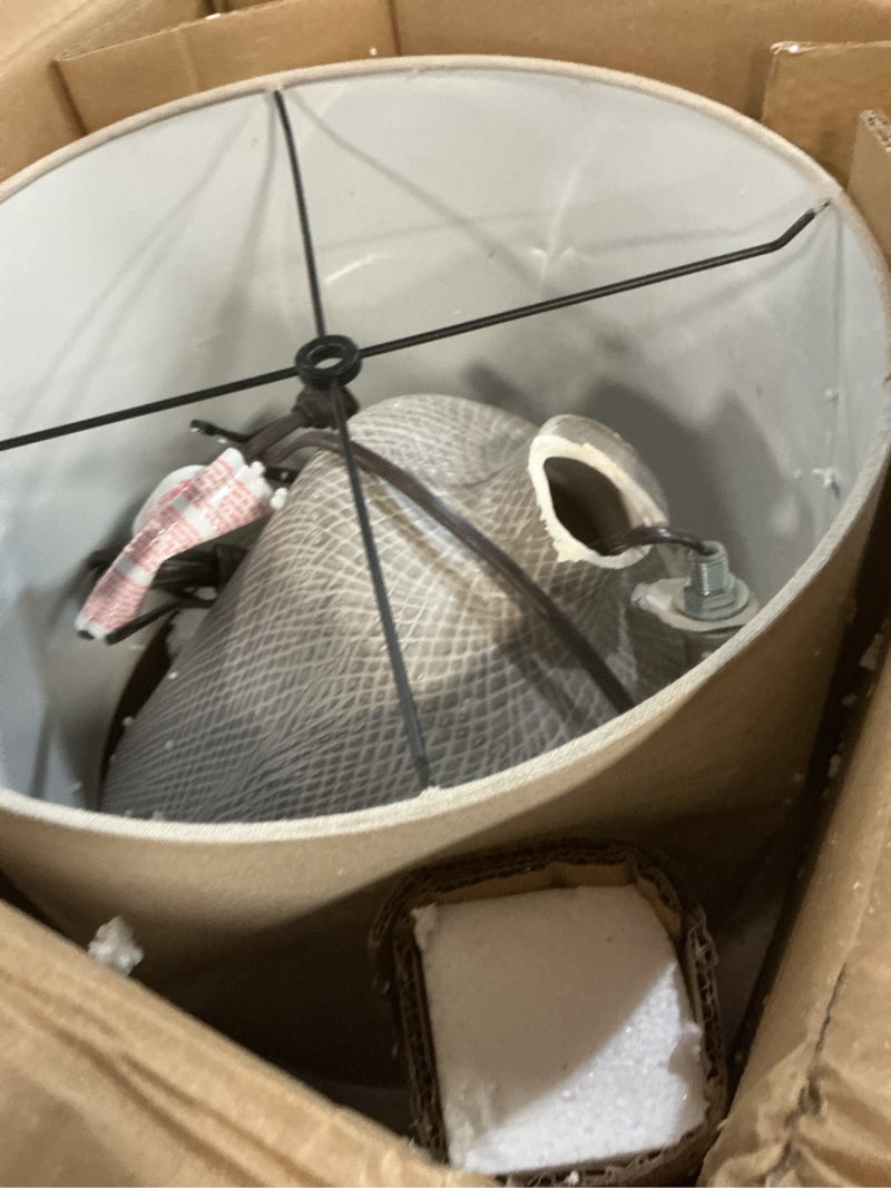 Condition photo showing As Is for Signature Design by Ashley Linus Modern 25" Ceramic Table Lamp, Natural Stone Finish Antique black