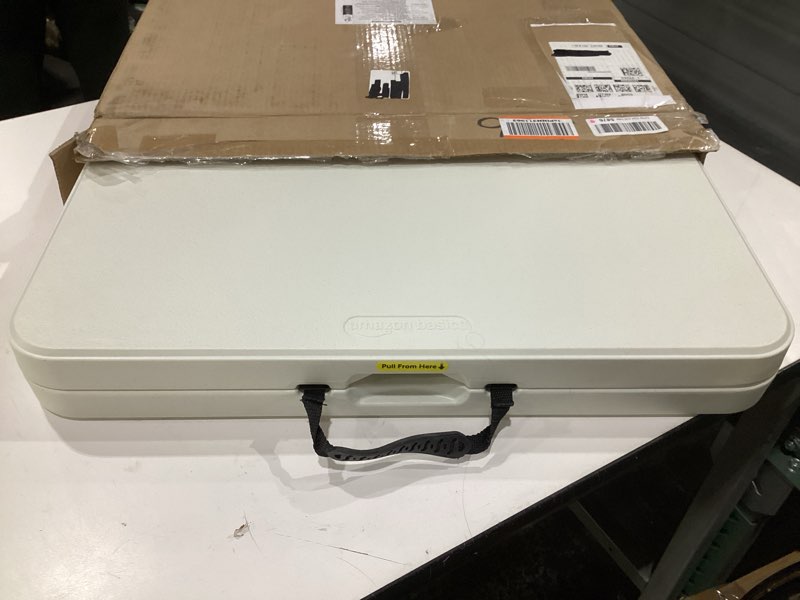 Condition photo showing Good Condition for Amazon Basics 4 Foot Rectangular Folding Dining Table, 4 Adjustable Height Settings with Carrying Handle, Indoor & Outdoor, White, 47.8 x 23.9 x 33.9 in