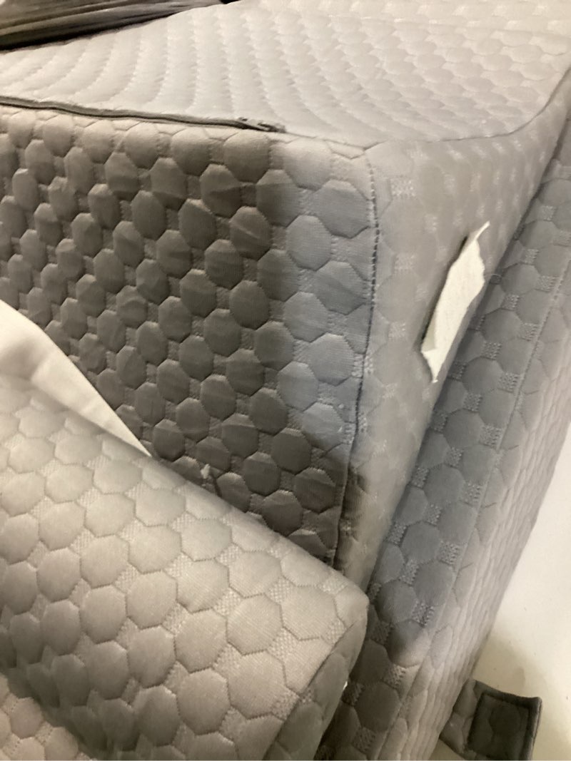 Condition photo showing As Is for grey wedge pillow