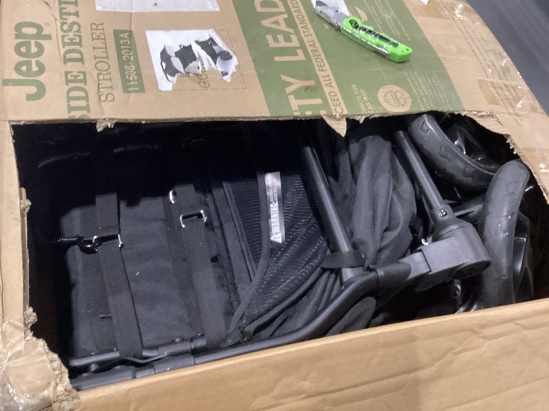 Condition photo showing New/Like New for jeep destination ultralight side x side double stroller, midnight
