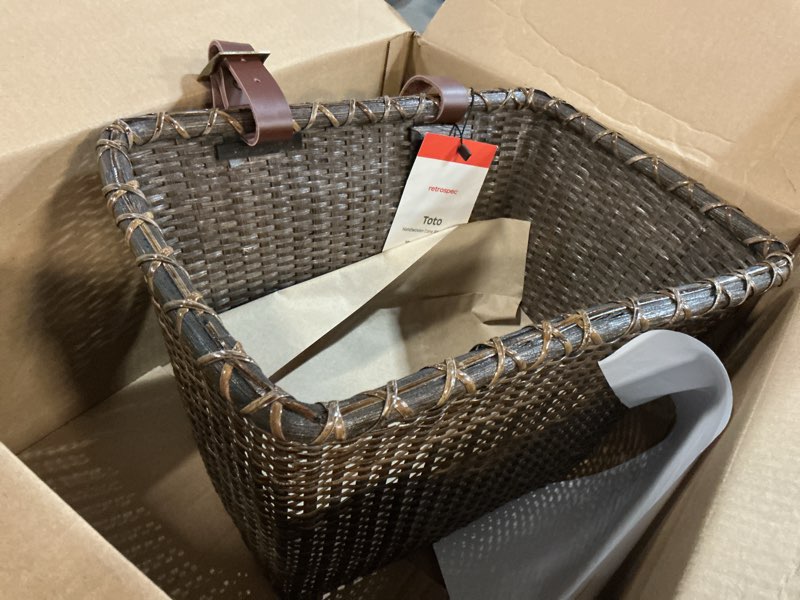 Condition photo showing Good Condition for cane woven rectangular toto basket with authentic leather straps and brass buckles dark stain toto basket