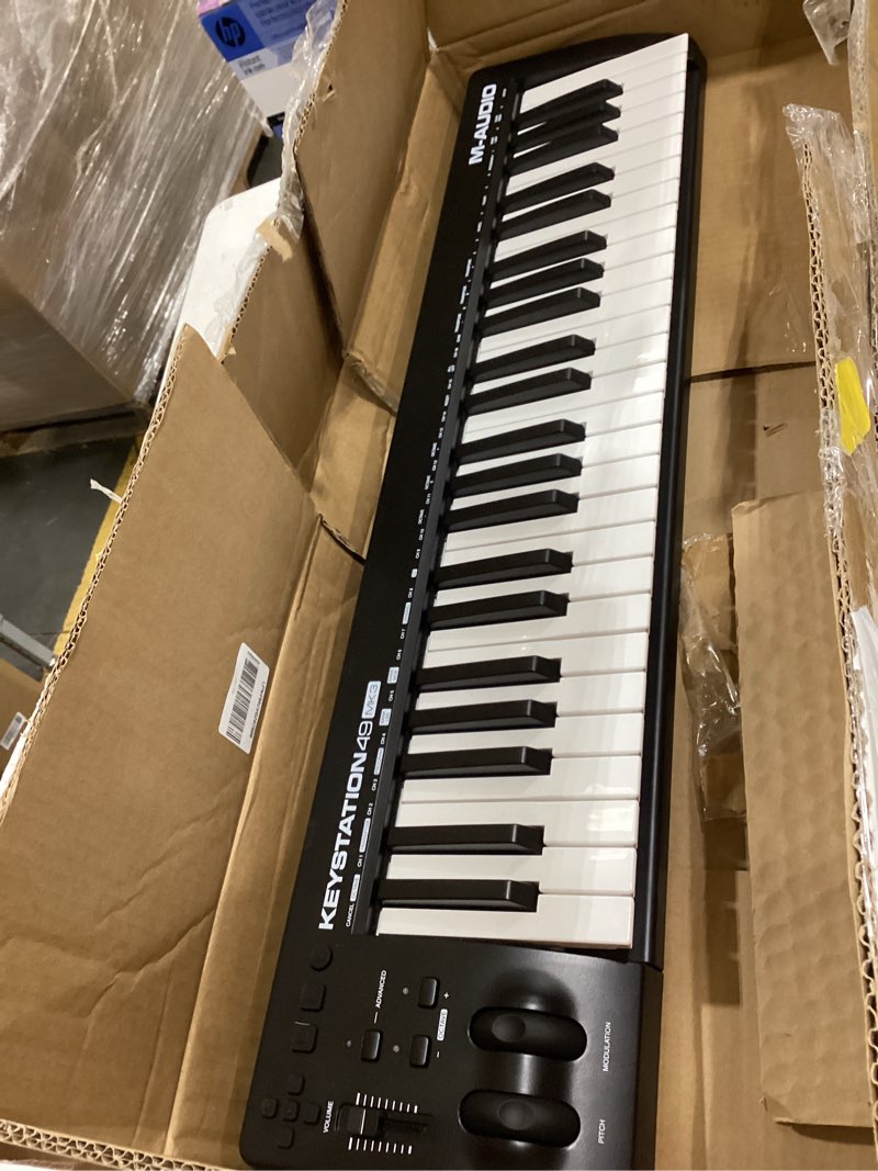 Condition photo showing As Is for m-audio keystation 49 mk3 - synth action 49 key usb midi keyboard controller with assignable controls, pitch and mod wheels, and software included keyboard only 49-key